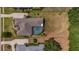 Overhead aerial view of home showcasing the large backyard with privacy fence and screened-in pool area at 5507 Keeler Oak St, Lithia, FL 33547