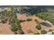 Aerial view of nearby field showing community sports fields with tennis courts, basketball court, and grassy area at 5507 Keeler Oak St, Lithia, FL 33547