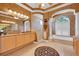 Well-appointed bathroom featuring and sinks, soaking tub, and separate shower at 5507 Keeler Oak St, Lithia, FL 33547