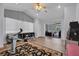 Bonus room with high ceilings, an exercise machine, and sliding glass doors to the patio at 5507 Keeler Oak St, Lithia, FL 33547