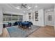 Elegant dining room with a view of the pool, and custom built-in cabinets at 5507 Keeler Oak St, Lithia, FL 33547