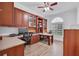 Spacious office with custom built-in desk, cabinetry, and large windows at 5507 Keeler Oak St, Lithia, FL 33547