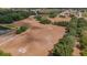 Aerial image of a sports field with goals and a baseball diamond at 5507 Keeler Oak St, Lithia, FL 33547