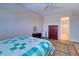 Well-lit bedroom with hardwood floors, a bed, and ample space for furniture at 6020 Shore S Blvd # 503, Gulfport, FL 33707