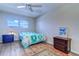 Comfortable bedroom with a bed, wooden floors, and natural light at 6020 Shore S Blvd # 503, Gulfport, FL 33707