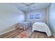 Bedroom with two twin beds and a ceiling fan at 6020 Shore S Blvd # 503, Gulfport, FL 33707
