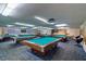 Spacious game room featuring multiple pool tables under bright, modern lighting at 6020 Shore S Blvd # 503, Gulfport, FL 33707