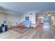 Comfortable living room area with hardwood floors, a cozy sofa, and a beautiful water view at 6020 Shore S Blvd # 503, Gulfport, FL 33707