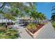 Scenic picnic area with tiki huts, providing a shaded retreat for outdoor dining and relaxation at 6020 Shore S Blvd # 503, Gulfport, FL 33707