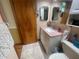 Bathroom features a pink granite countertop on the vanity at 6073 115Th N Ave, Pinellas Park, FL 33782