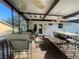 Outdoor patio features ceiling fans, bar seating, and a dining area, perfect for entertaining at 6073 115Th N Ave, Pinellas Park, FL 33782