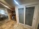 Kitchen featuring frosted glass pantry doors and stainless steel oven at 6073 115Th N Ave, Pinellas Park, FL 33782