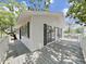 Well-maintained home with large deck and sliding doors, great for outdoor entertaining at 6610 Myrna Dr, Tampa, FL 33619