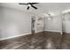 Open-concept living area features arched doorways and recessed lighting at 7606 Nottinghill Sky Dr, Apollo Beach, FL 33572