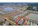 Enjoy this aerial view of a peaceful neighborhood with a focus on the property in the foreground at 8214 Wheat Stone Dr, Zephyrhills, FL 33540