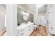A recently remodeled bathroom with tile floors, modern vanity, and updated fixtures at 9535 Norchester Cir, Tampa, FL 33647