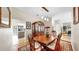 Formal dining room featuring a large wooden table set and detailed china cabinet at 9535 Norchester Cir, Tampa, FL 33647