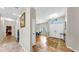 Tiled hallway leading to the bedrooms and living area of this well-maintained home at 9535 Norchester Cir, Tampa, FL 33647