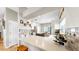 Open-concept kitchen featuring countertops, dining area, and wine rack at 9535 Norchester Cir, Tampa, FL 33647