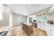 Spacious kitchen with a center island, stainless steel appliances, and abundant countertop space at 9535 Norchester Cir, Tampa, FL 33647