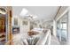 Bright living room features a fireplace, comfortable white couches, and tiled floors at 9535 Norchester Cir, Tampa, FL 33647