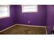Bedroom with purple walls and bright natural light at 101 S Maywood Ave, Clearwater, FL 33765