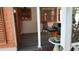 Covered patio with a grill and comfortable seating at 101 S Maywood Ave, Clearwater, FL 33765