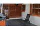 Covered patio with a grill and comfortable seating area at 101 S Maywood Ave, Clearwater, FL 33765