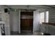 Open storage shed featuring shelving and dual doors for easy access at 101 S Maywood Ave, Clearwater, FL 33765