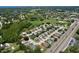 Bird's eye view shows neighborhood layout, nearby ponds, and access to a main thoroughfare at 10520 Tapestry Dr, Port Richey, FL 34668