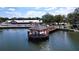 Waterfront gazebo and dock, perfect for relaxing by the lake at this resort-style community at 10520 Tapestry Dr, Port Richey, FL 34668