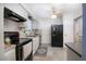 Updated kitchen with black appliances, gray cabinets and tile backsplash at 11200 102Nd Ave # 62, Seminole, FL 33778