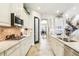 Bright kitchen featuring stainless steel appliances, granite countertops and tile backsplash at 11327 Lake Lucaya Dr, Riverview, FL 33579