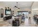 Open living room with high ceilings, tile floors, stylish decor, and water views at 11327 Lake Lucaya Dr, Riverview, FL 33579