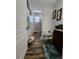 Bright bathroom with wood-style tile flooring, gray walls, and a modern vanity, offering a clean and inviting space at 11617 Brighton Knoll Loop, Riverview, FL 33579