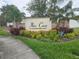 Ibis Cove at Southfork East community sign with lush landscaping at 11617 Brighton Knoll Loop, Riverview, FL 33579
