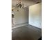 Spacious living room featuring neutral paint ready for customization with adjacent dining area at 1204 W Alsobrook St, Plant City, FL 33563