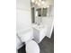 Bright bathroom featuring modern fixtures, vanity with sink, and toilet, offering both style and functionality at 1237 Blenheim Ct, Wesley Chapel, FL 33543