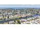 Stunning aerial view of a waterfront community with canals, homes, and access to the ocean at 13039 Keel Ct, Hudson, FL 34667