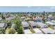 Aerial view showcases waterfront homes and canals extending toward the ocean horizon at 13039 Keel Ct, Hudson, FL 34667