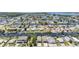 An aerial view of numerous homes lining the canals, waterways, and ocean in this waterfront community at 13039 Keel Ct, Hudson, FL 34667