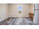 Eat-in kitchen area with luxury vinyl flooring and a large window for natural light at 13039 Keel Ct, Hudson, FL 34667