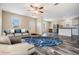 Open floor plan with living room and kitchen with LVP flooring at 13039 Keel Ct, Hudson, FL 34667