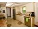 Bright kitchen with granite countertops, stainless steel appliances, and tiled flooring at 13878 Oak Forest N Blvd, Seminole, FL 33776