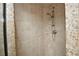 The tiled shower features a built-in bench and an accent wall of pebble-style mosaic tiles at 13878 Oak Forest N Blvd, Seminole, FL 33776