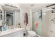 Neat bathroom featuring sink vanity, toilet, towel rack and walk-in shower at 14107 Mossy Glen Ln # 203, Tampa, FL 33613