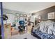 Bedroom featuring a work station and workout equipment at 14107 Mossy Glen Ln # 203, Tampa, FL 33613