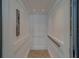 Interior view of a modern elevator with sleek design and accessible controls at 15805 Redington Dr, Redington Beach, FL 33708