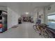 Large, well-lit garage offering plenty of storage and space for multiple vehicles and recreational equipment at 15805 Redington Dr, Redington Beach, FL 33708