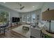 Cozy living room with water views and lots of natural light at 15805 Redington Dr, Redington Beach, FL 33708